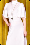 An ivory velvet Morgiana maxi dress by Scorpio Rising