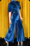 A peacock blue velvet Morgiana jumpsuit by Scorpio Rising