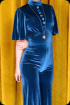 A peacock blue velvet Morgiana jumpsuit by Scorpio Rising