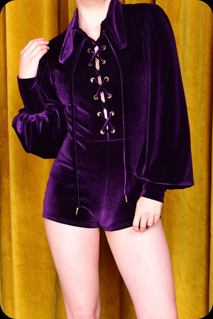 An amethyst velvet Juniper playsuit by Scorpio Rising