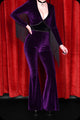 An amethyst velvet studded fringed Alucarda bell bottom jumpsuit by Scorpio Rising