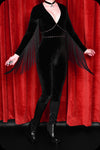 An ebony velvet studded fringed Alucarda skinny leg jumpsuit by Scorpio Rising