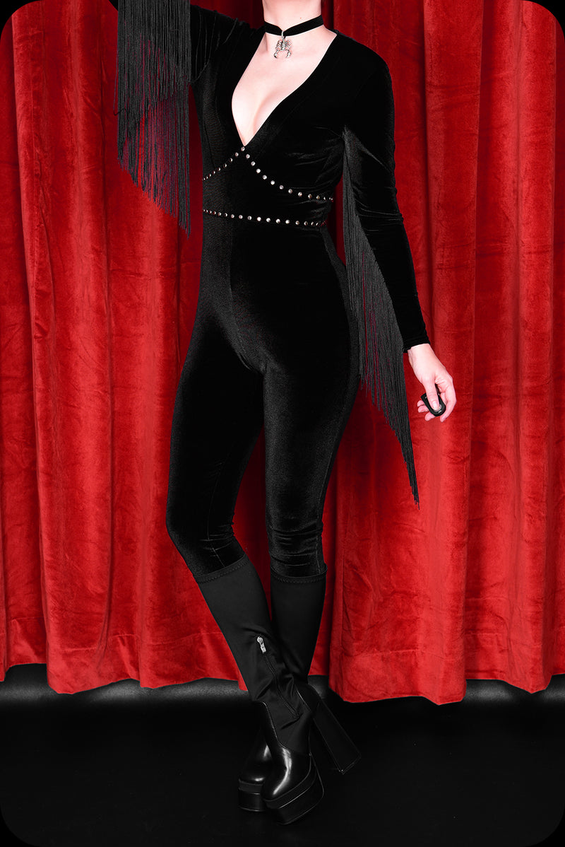 An ebony velvet studded fringed Alucarda skinny leg jumpsuit by Scorpio Rising