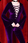 An amethyst velvet lace up Sabbath bell bottom jumpsuit by Scorpio Rising