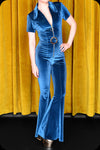 A peacock blue velvet Solaris bell bottom jumpsuit by Scorpio Rising