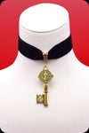 A black velvet antique gold key choker necklace by Scorpio Rising