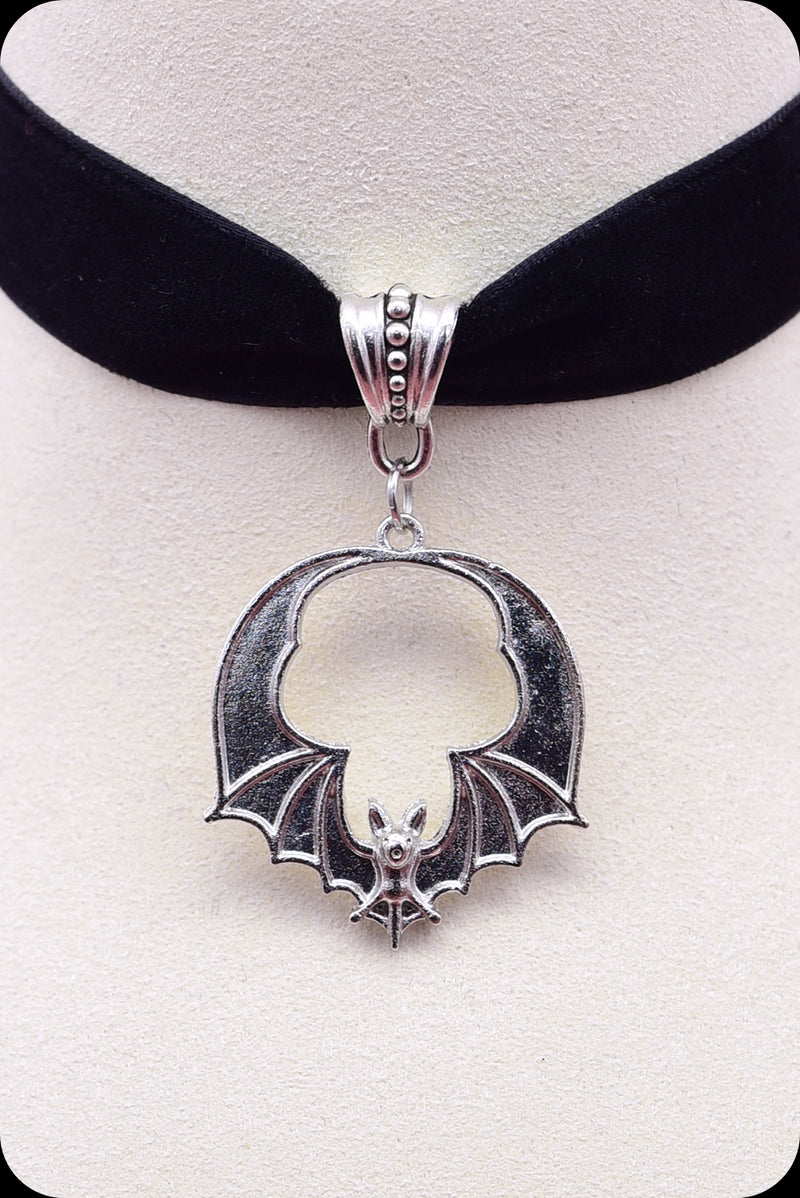 A black velvet silver bat choker necklace by Scorpio Rising