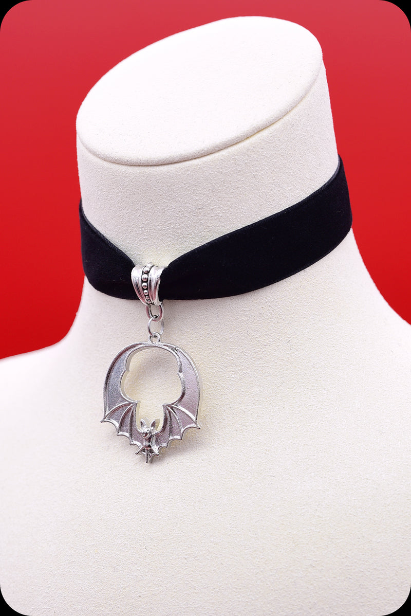 A black velvet silver bat choker necklace by Scorpio Rising