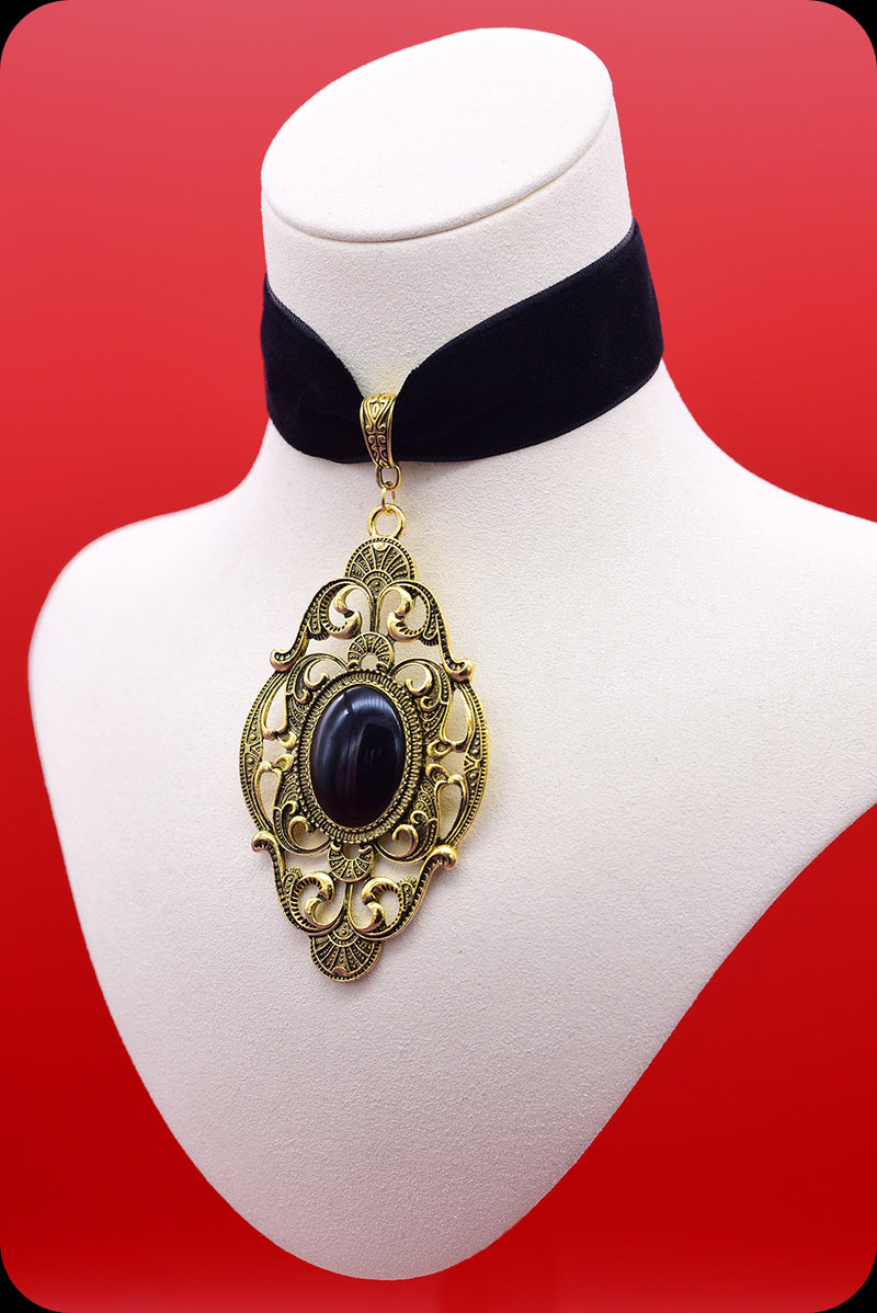 A black velvet antique gold black cabochon choker necklace by Scorpio Rising