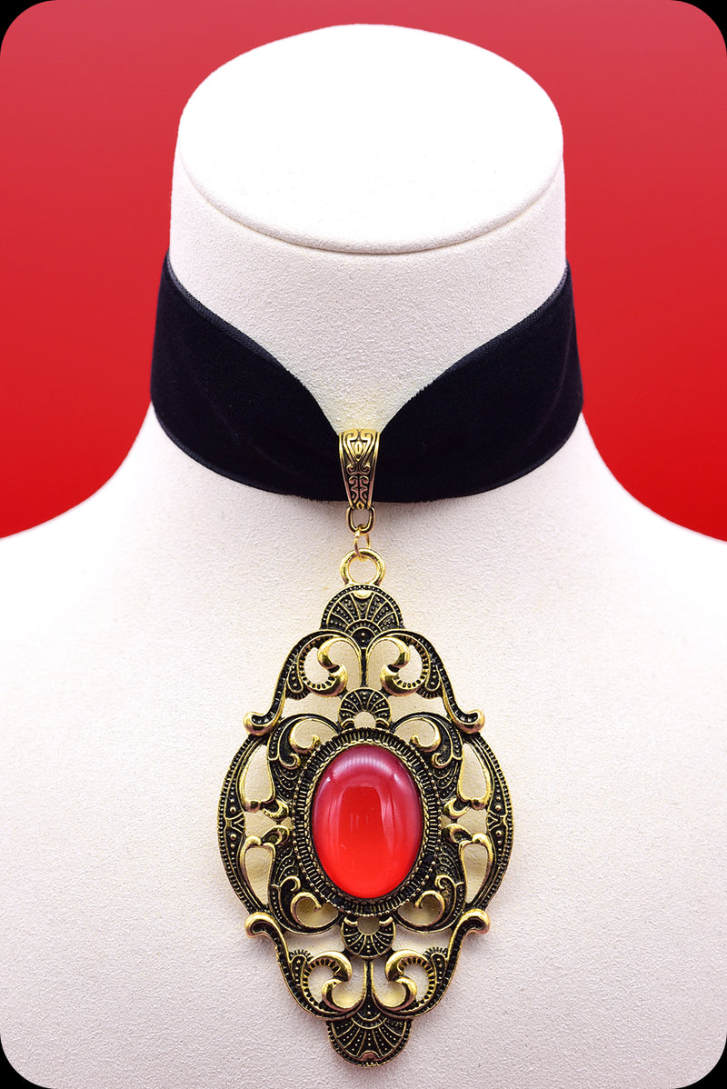 A black velvet antique gold red cabochon choker necklace by Scorpio Rising
