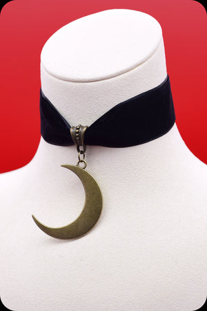 A black velvet antique brass crescent moon choker necklace by Scorpio Rising