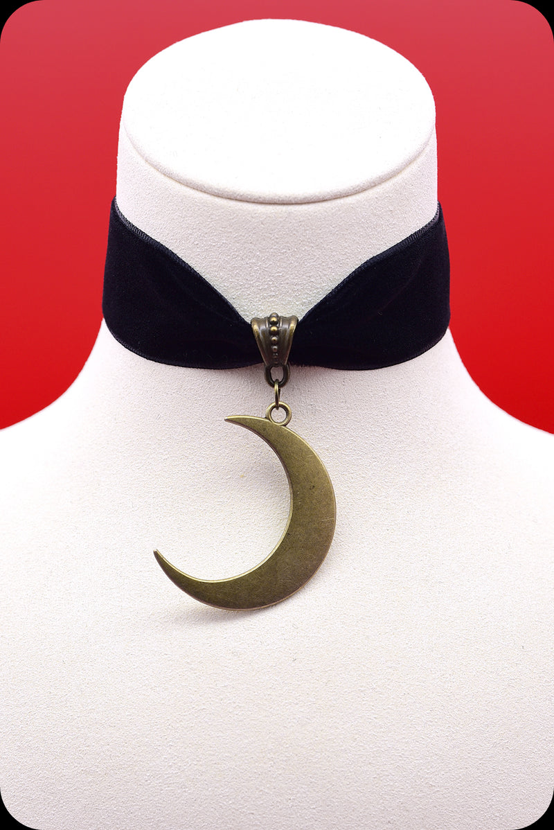 A black velvet antique brass crescent moon choker necklace by Scorpio Rising