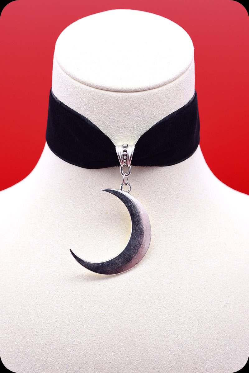 A black velvet antique silver crescent moon choker necklace by Scorpio Rising