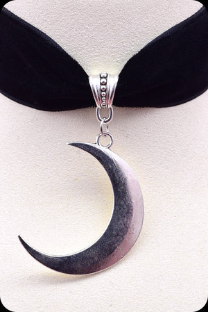A black velvet antique silver crescent moon choker necklace by Scorpio Rising