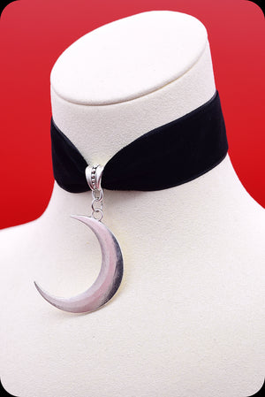 A black velvet antique silver crescent moon choker necklace by Scorpio Rising