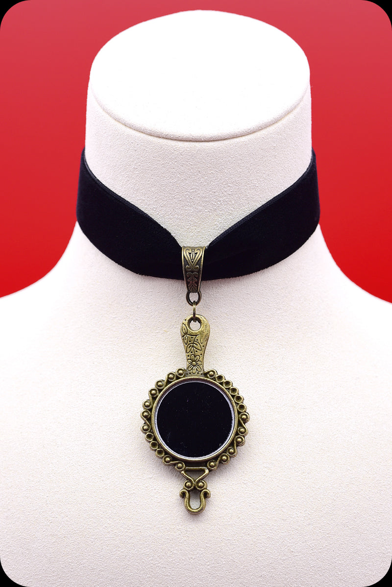A black velvet antique brass looking glass choker necklace by Scorpio Rising