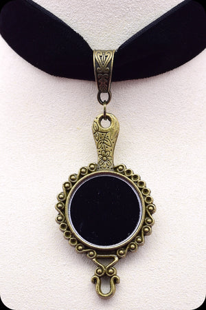 A black velvet antique brass looking glass choker necklace by Scorpio Rising