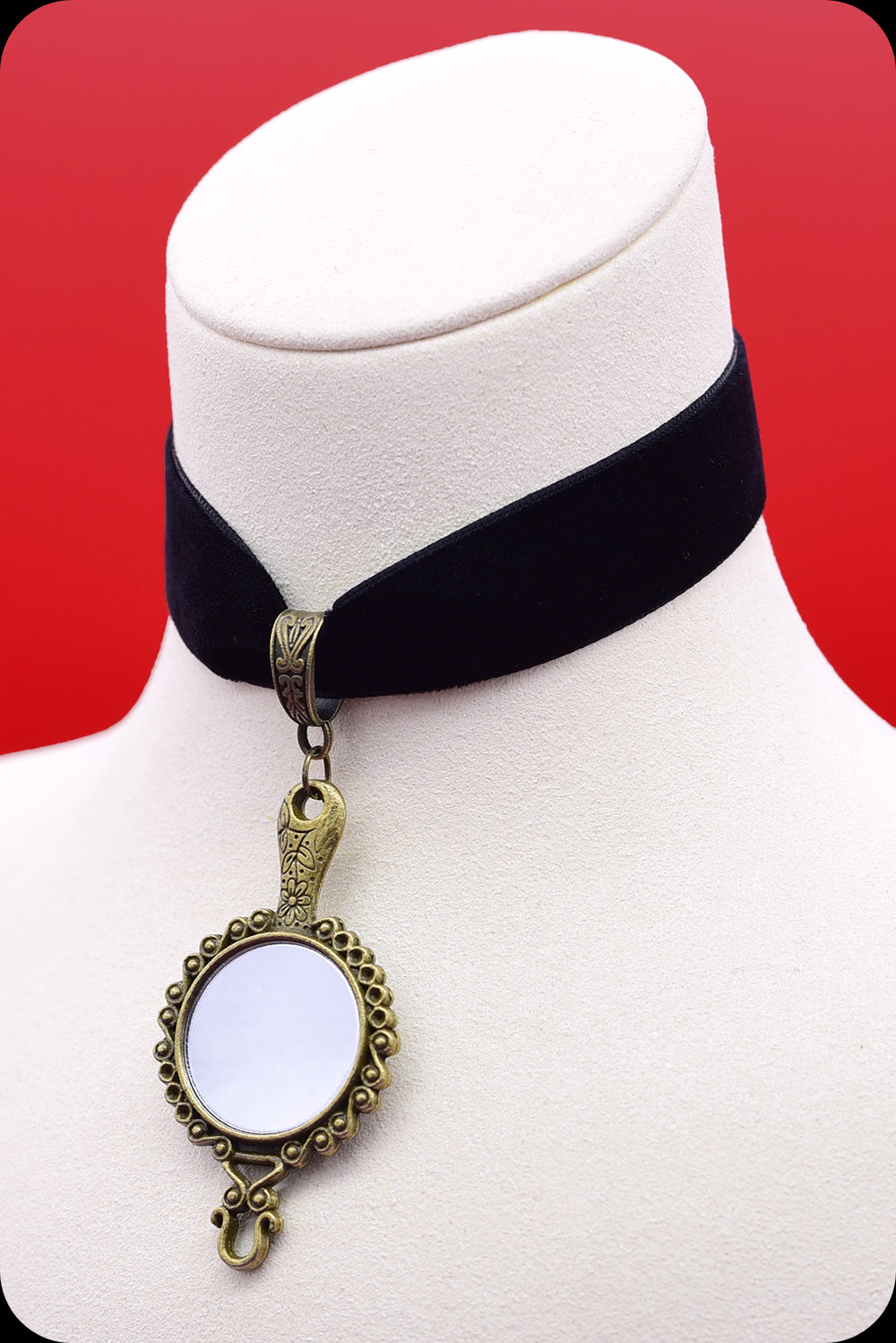 A black velvet antique brass looking glass choker necklace by Scorpio Rising
