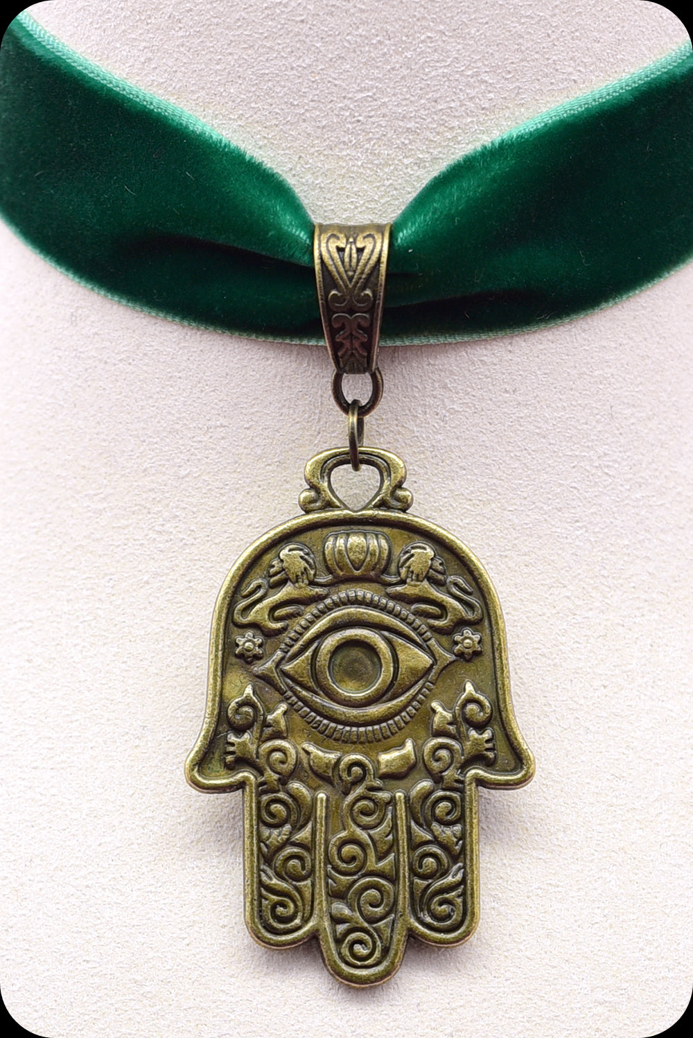 A green velvet antique brass hamsa choker necklace by Scorpio Rising