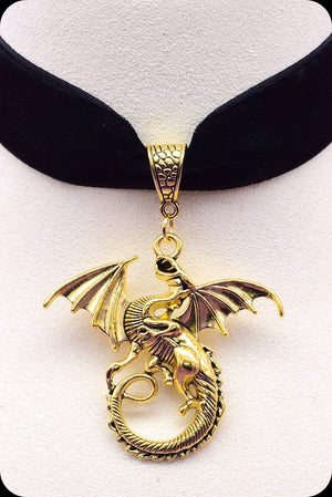 A black velvet antique gold dragon choker necklace by Scorpio Rising