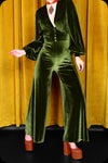 A green velvet Suspiria jumpsuit by Scorpio Rising