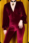 A ruby velvet Suspiria jumpsuit by Scorpio Rising