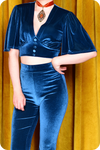 A peacock blue velvet Supiria bell bottom co-ord set by Scorpio Rising