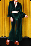 An emerald green velvet Supiria crop top by Scorpio Rising