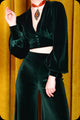 An emerald green velvet Supiria crop top by Scorpio Rising