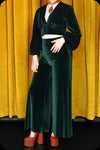 An emerald green velvet Supiria crop top by Scorpio Rising