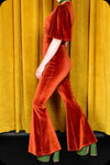A copper velvet Suspiria jumpsuit by Scorpio Rising