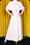 An ivory velvet Morgiana maxi dress by Scorpio Rising