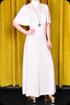 An ivory velvet Morgiana maxi dress by Scorpio Rising