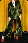 A green velvet Suspiria jumpsuit by Scorpio Rising
